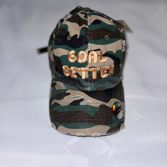 “GOAL GETTER” DISTRESSED CAMO HAT
